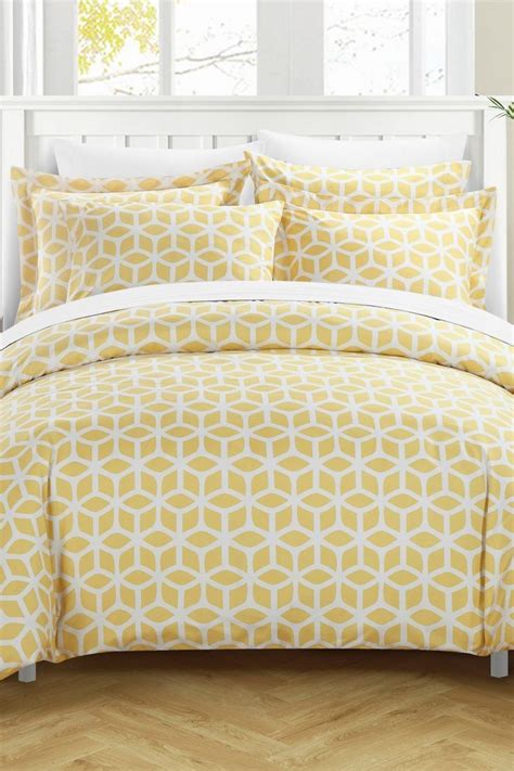 Classic duvet cover set with Beautifully decorated pom pom trim. . Nordstrom rack duvet covers